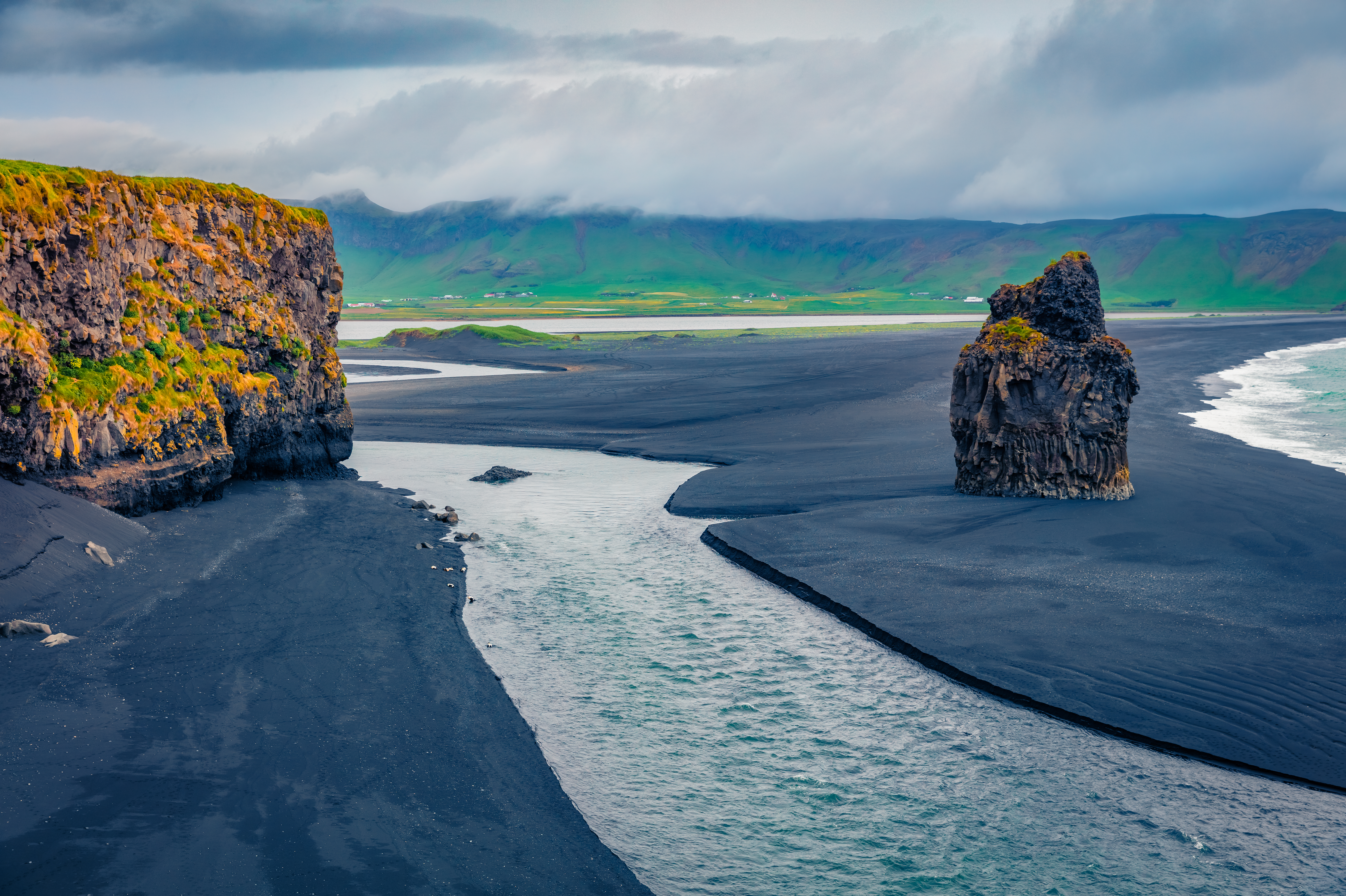 Dramatic scenery of the black sand beach of Reynisfjara Beach