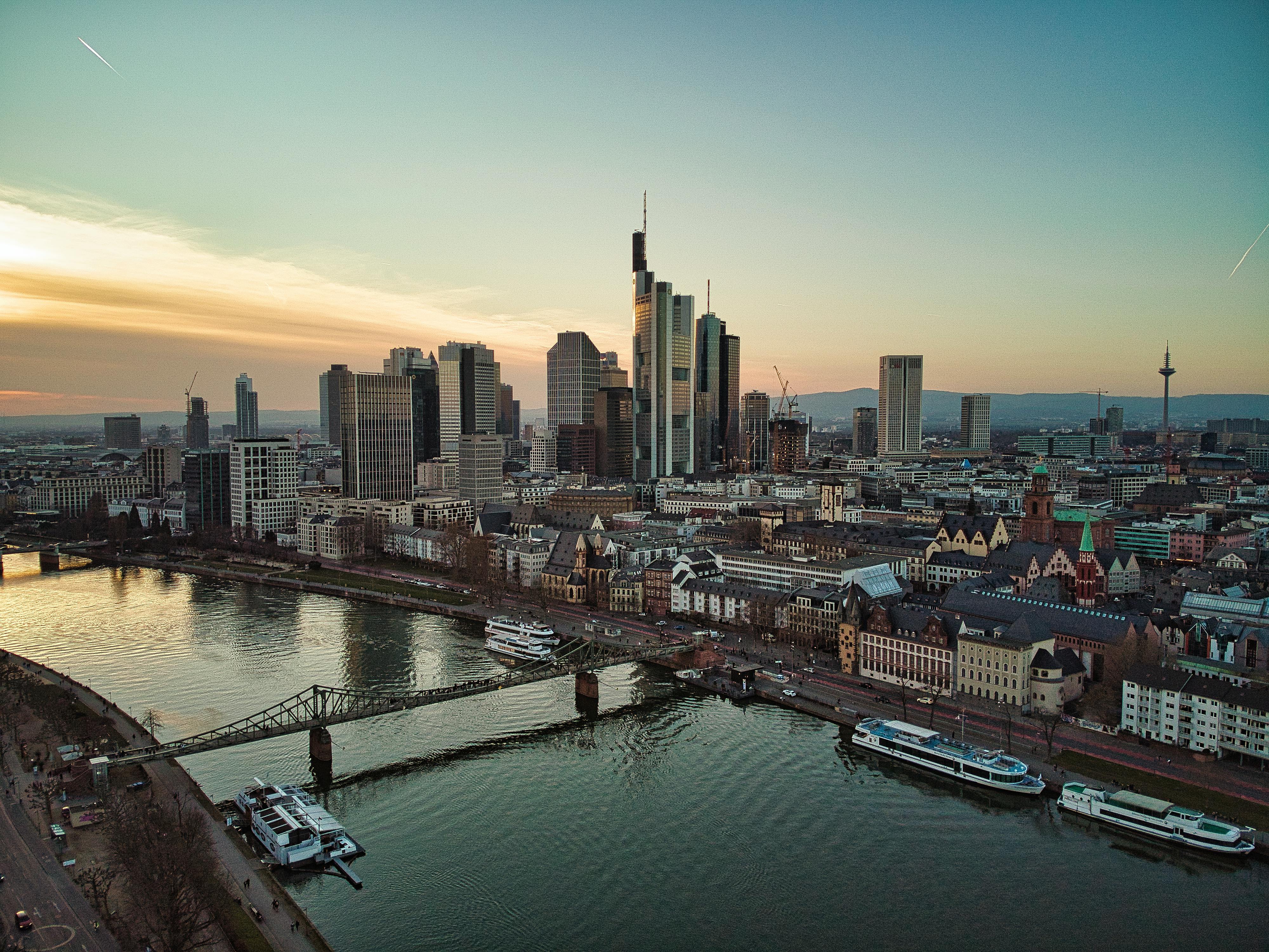 Drone view of the river in Frankfurt, Germany, backed by the city skyline