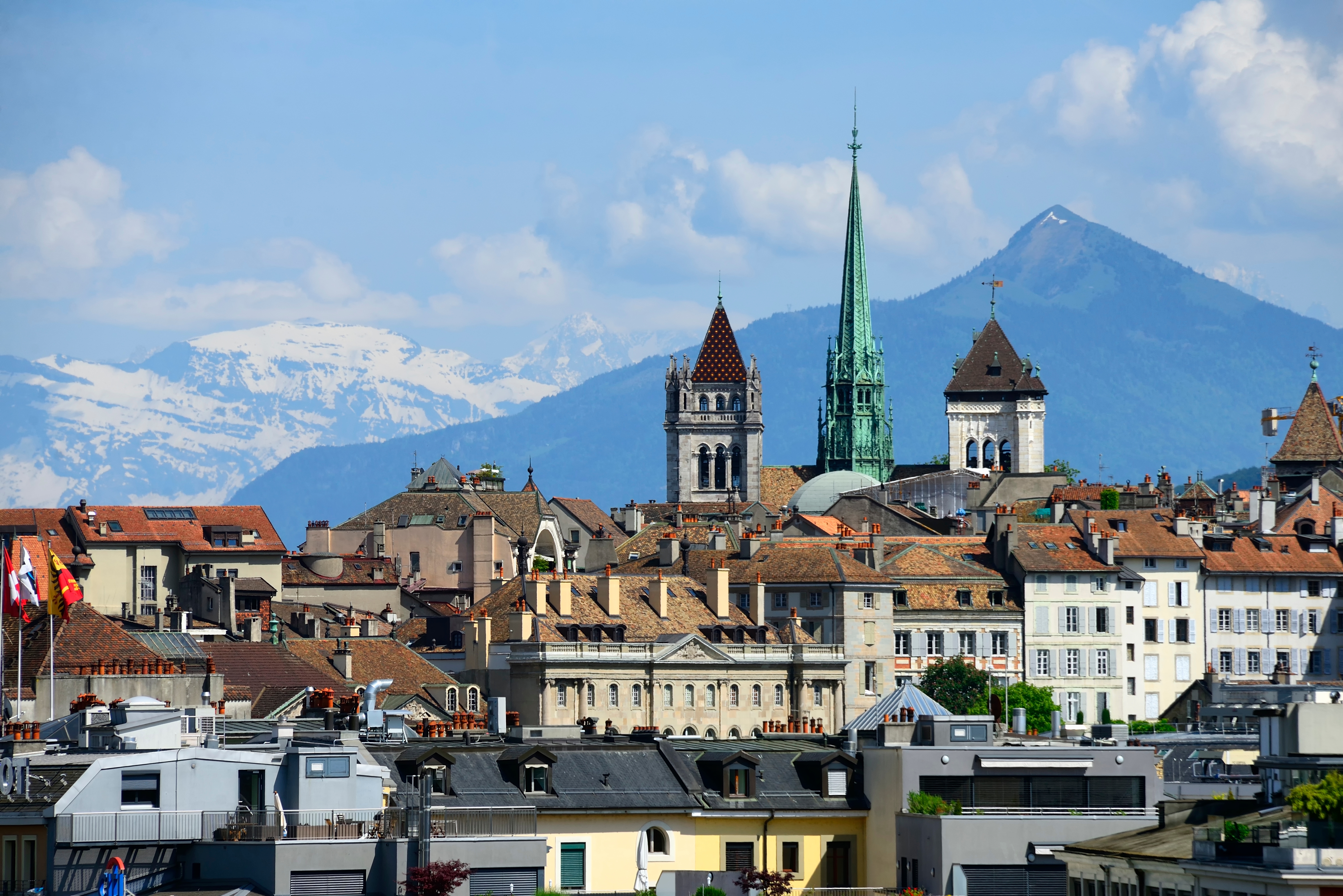 Geneva skyline backed by mountains in Switzerland