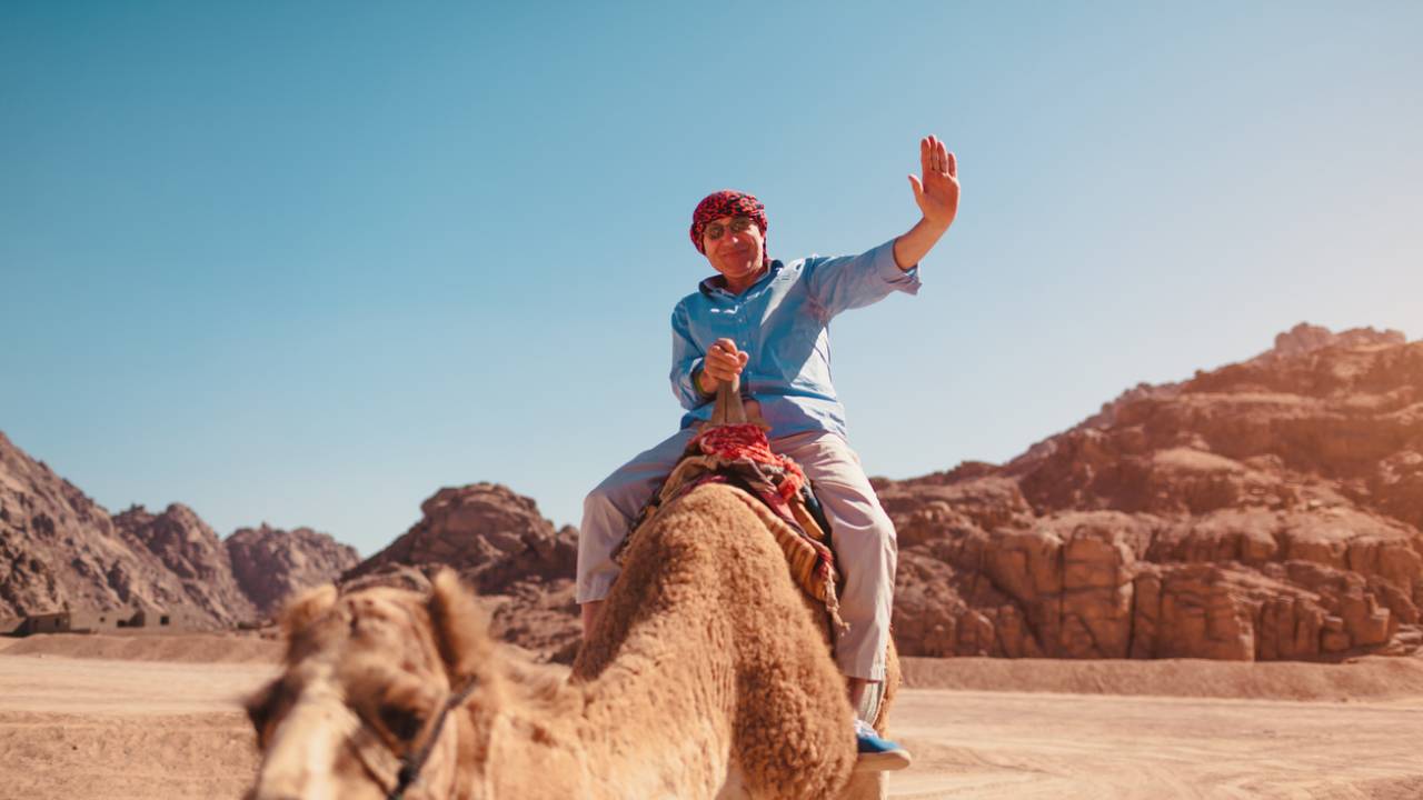 Book Fossil Safari Dubai: Sandboarding, Camel and Camp | DoTravel