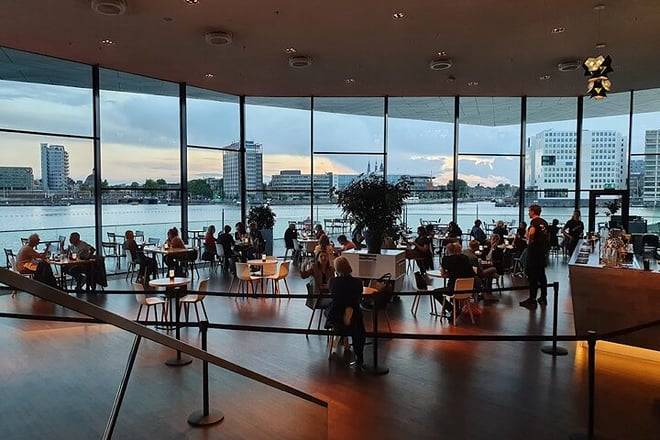 Adam Lookout Amsterdam with drinks and Eye Filmmuseum Ticket